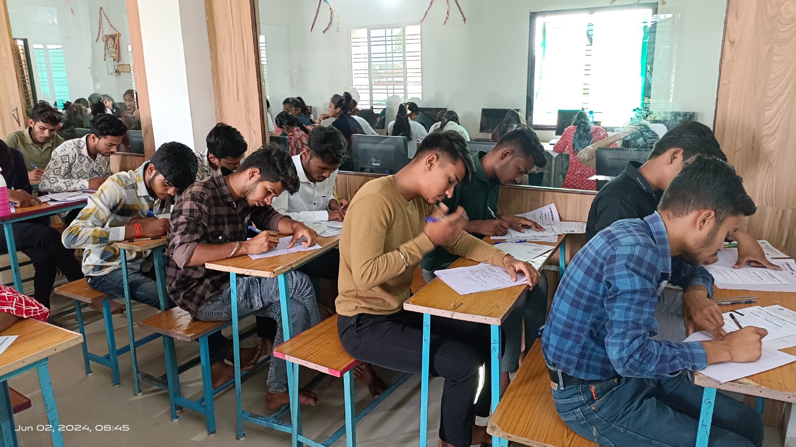 Exam hall — students writing exam
